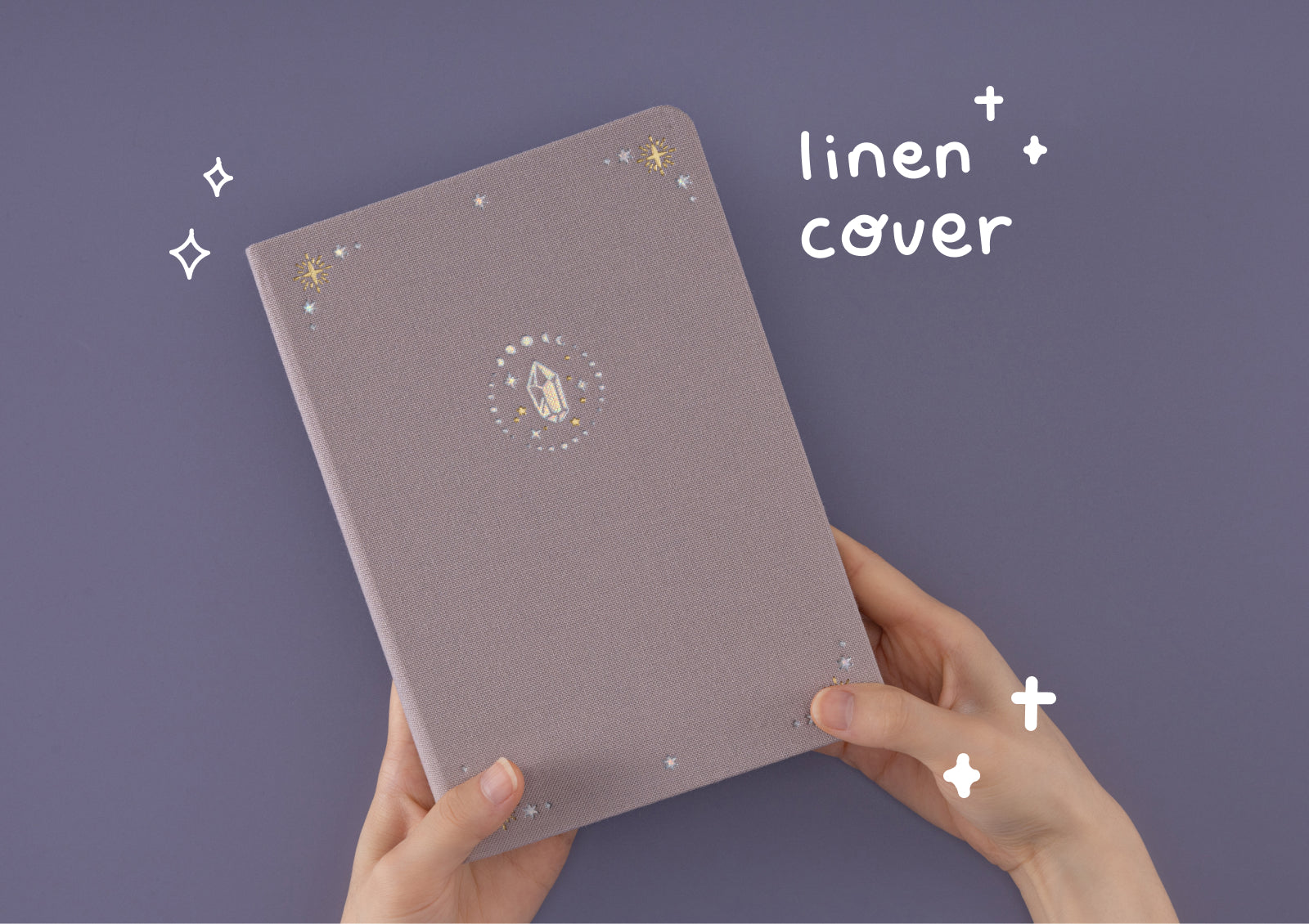 Flat lay of Tsuki Moonflower Magic Crystal Magic Notebook with matching stationery props and celestial decor.