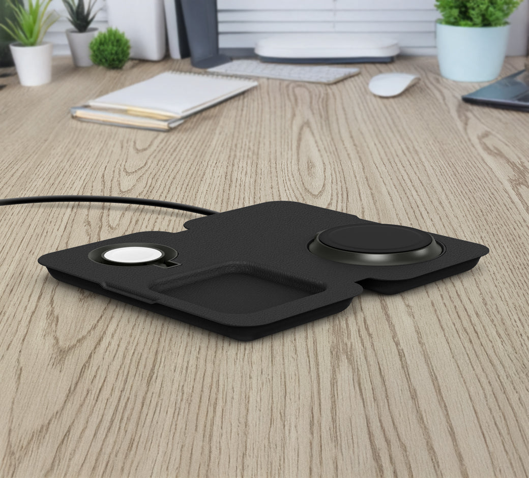 A close-up of a wireless charging dock for phone and AirPods on a wooden desk.
