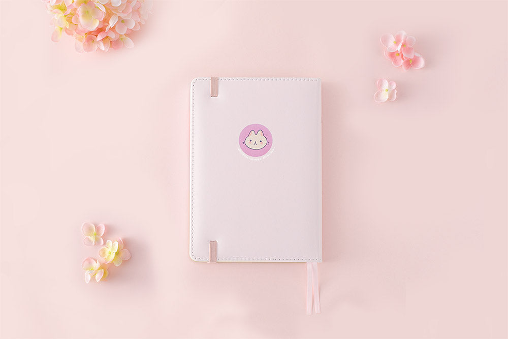 back cover spring notebook in pink background