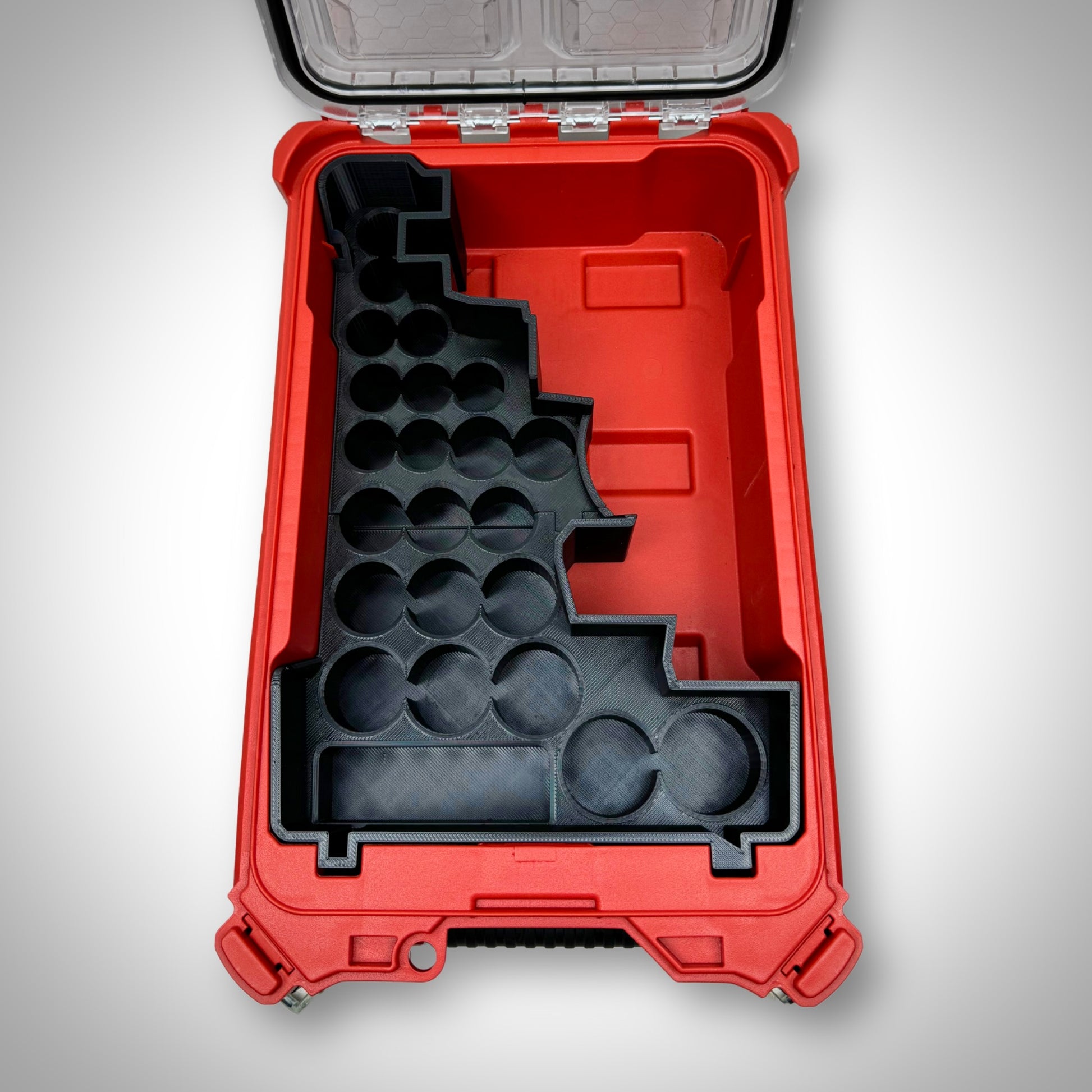 Empty custom insert for M18 1/2" Impact Wrench and sockets resting inside the PACKOUT™ Compact Organiser, highlighting precise cutouts.