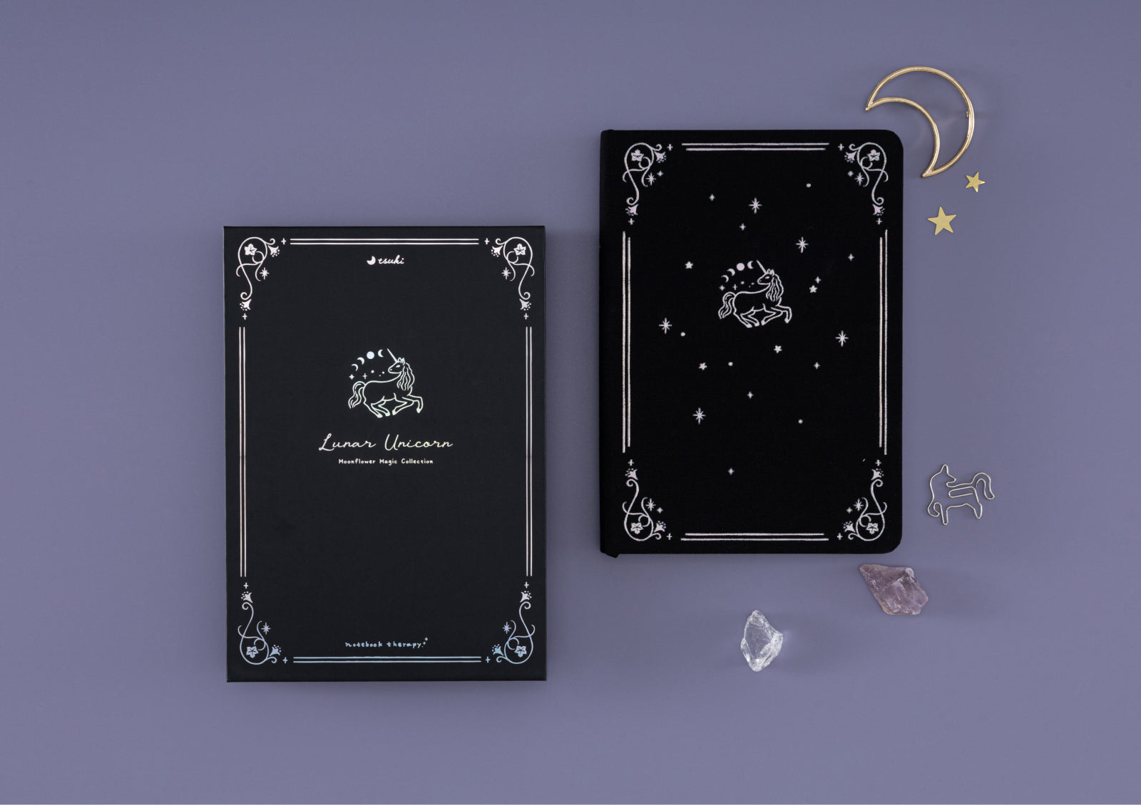 Front cover of the Tsuki Moonflower Magic Lunar Unicorn Notebook featuring celestial patterns and foiled unicorn design.