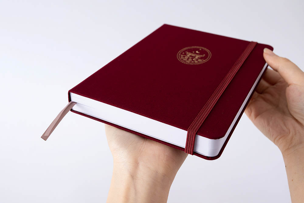 holding Tsuki torii bullet journal