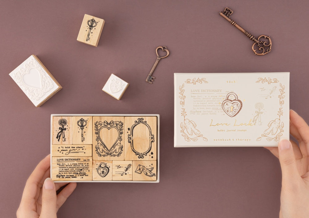 Hands holding opened Love Lock stamps box