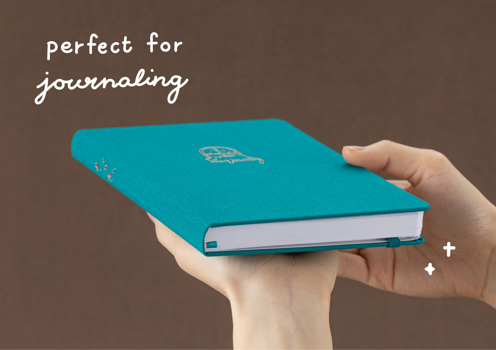 Tsuki Neko Dreams Sleepy Neko Notebook styled with gold pen, dried flowers, and cozy star and cloud props.