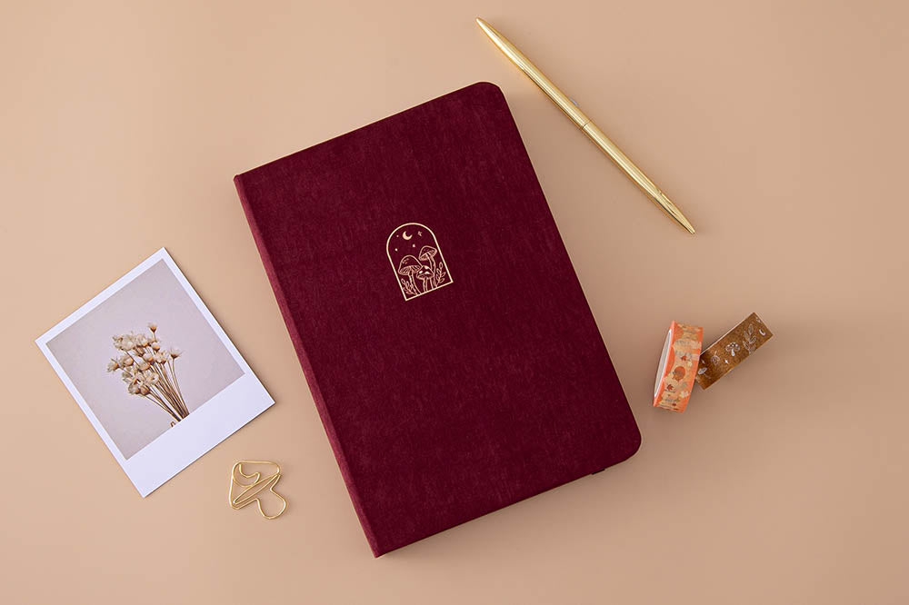 Tsuki ‘Kinoko’ Limited Edition Bullet Journal with free paperclip gift with Tsuki ‘Maple Dreams’ Washi Tapes and gold pen and dried flowers on beige background