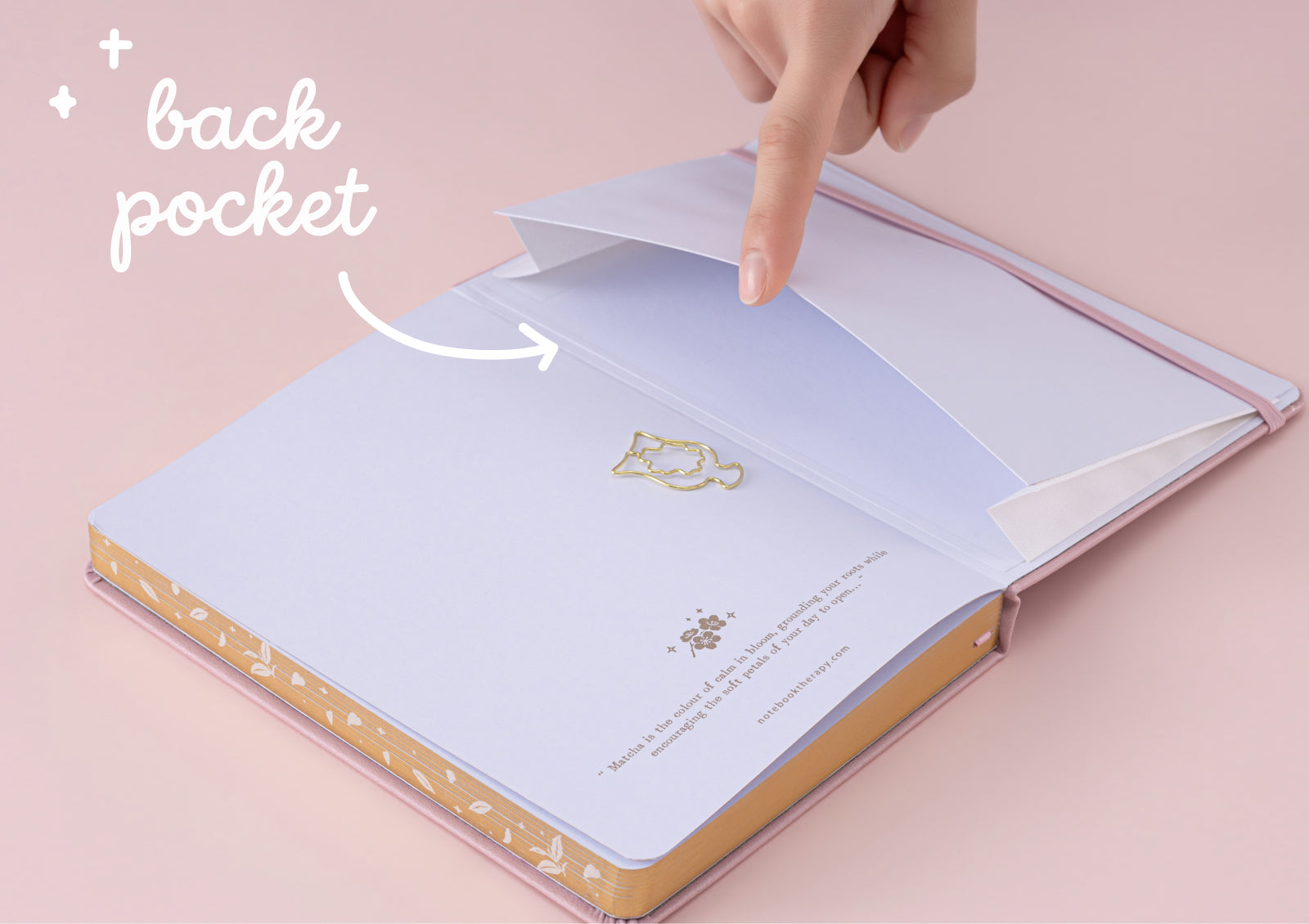 The open back cover of the notebook showing the expandable back pocket and a printed quote about matcha.