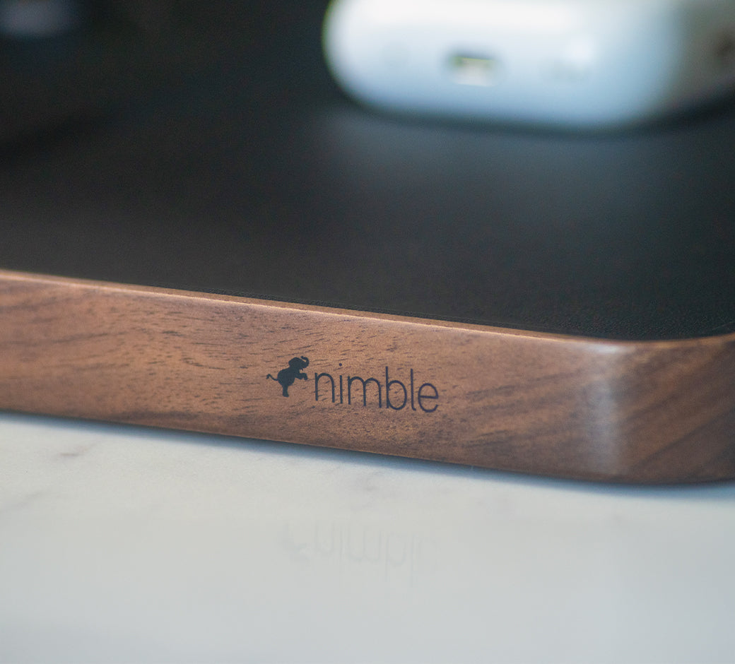 Charging station with wireless charging pad for multiple devices.