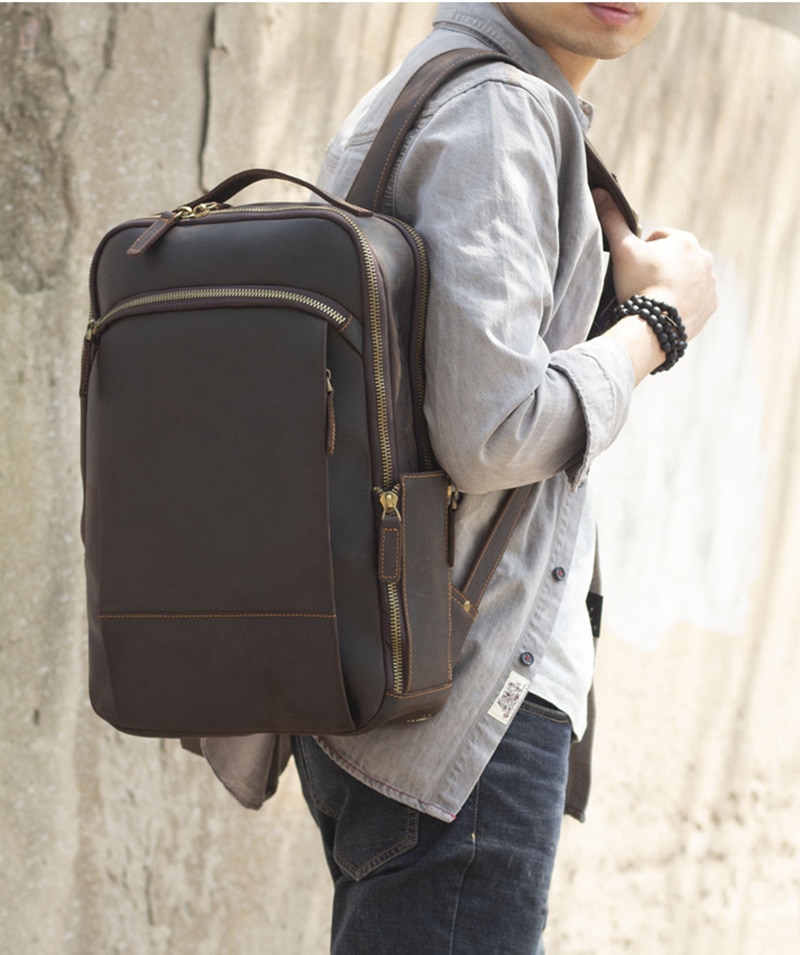 Outdoor Model&nbsp;Show&nbsp;of Woosir Leather Laptop Backpack with Trolley Sleeve and Double Compartments