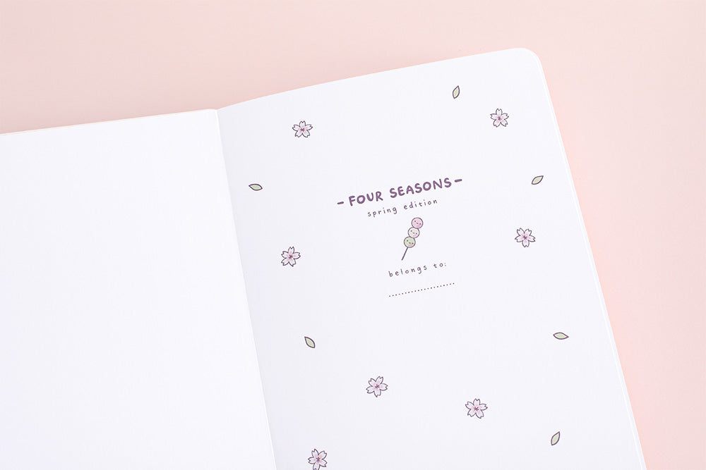 front cover spring notebook in pink background