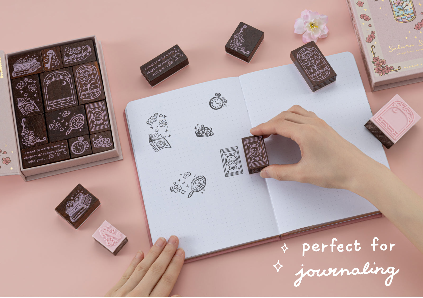 Demonstration of the stamps being used in a bullet journal to create mirror, clock, and floral frame impressions.