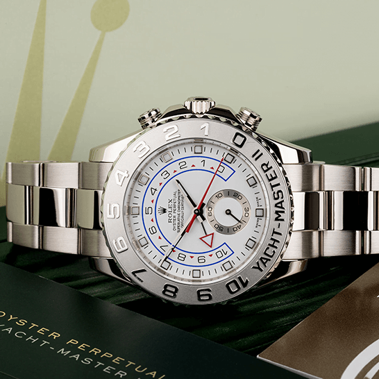 Rolex Yatch Master 116689-0001 White Dial Replica next to warranty card