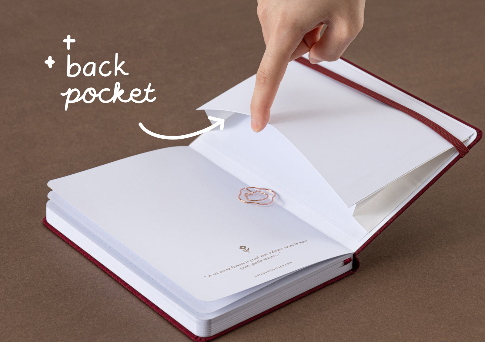 Tsuki Neko Dreams Neko Bouquet Notebook open to dotted pages with matching burgundy ribbon bookmarks.