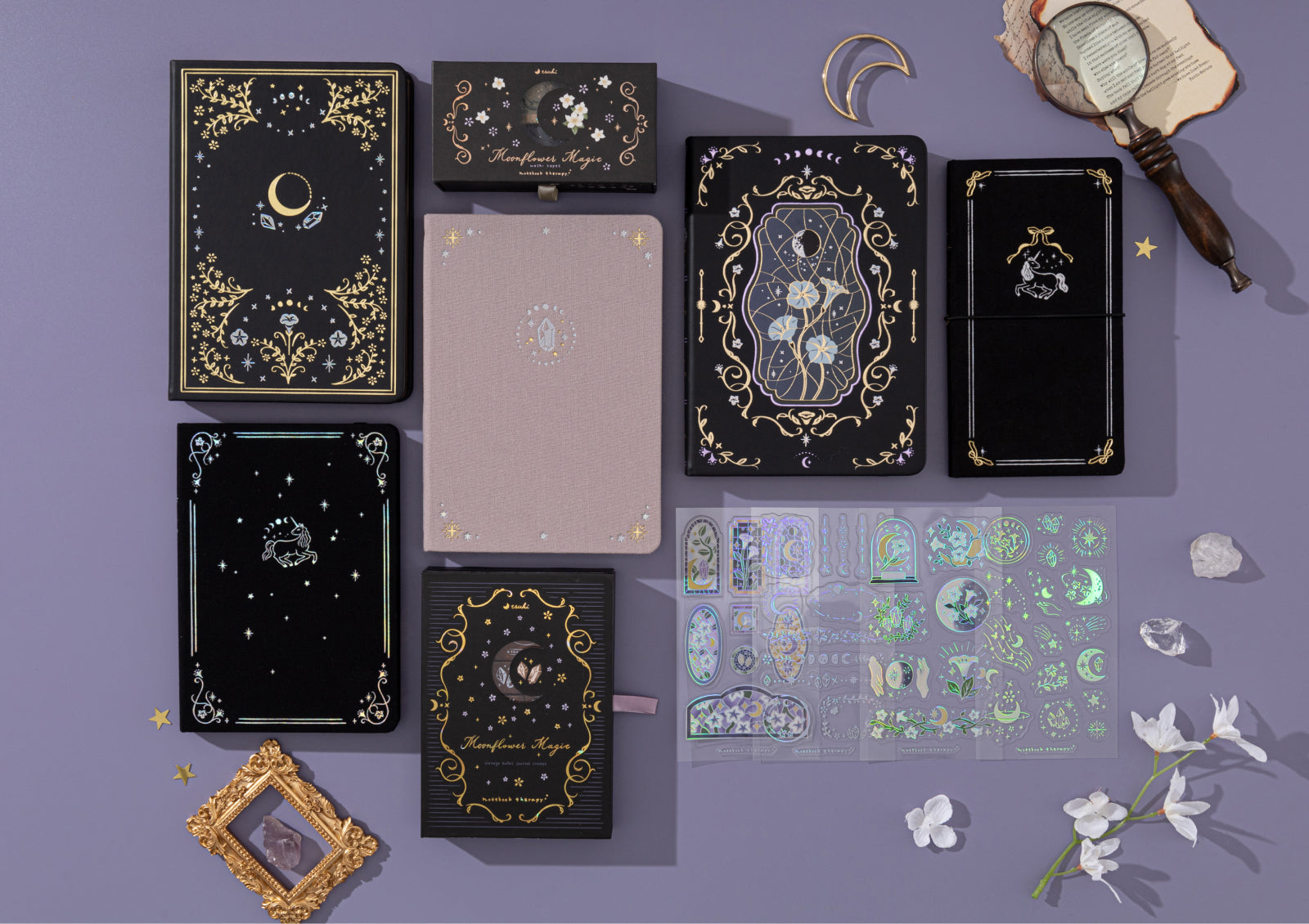 Side view of the Tsuki Moonflower Magic Lunar Unicorn Notebook black edition with foiled details and elastic closure.