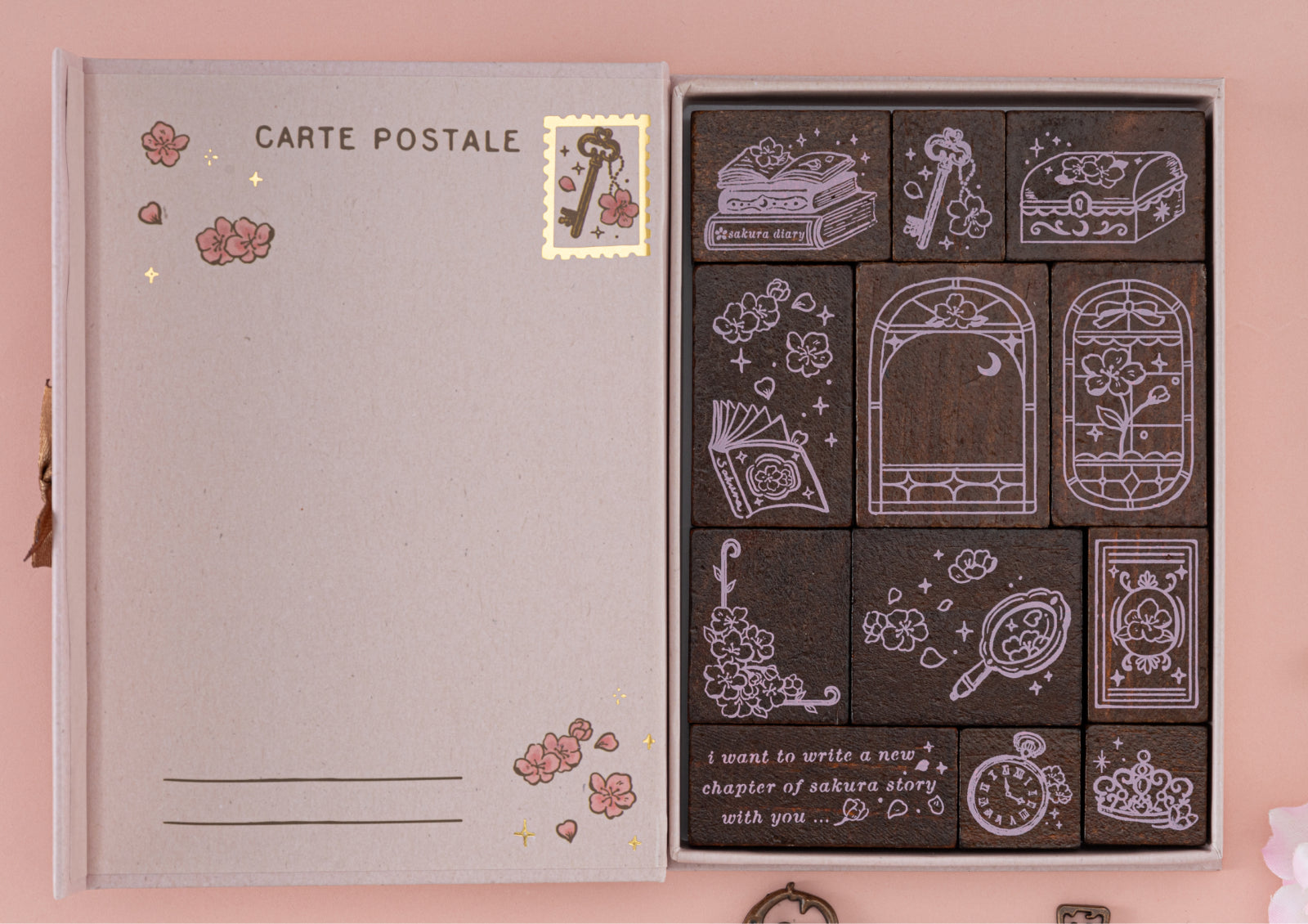 A top-down view of all twelve wooden stamps neatly organized in their matching storage case.