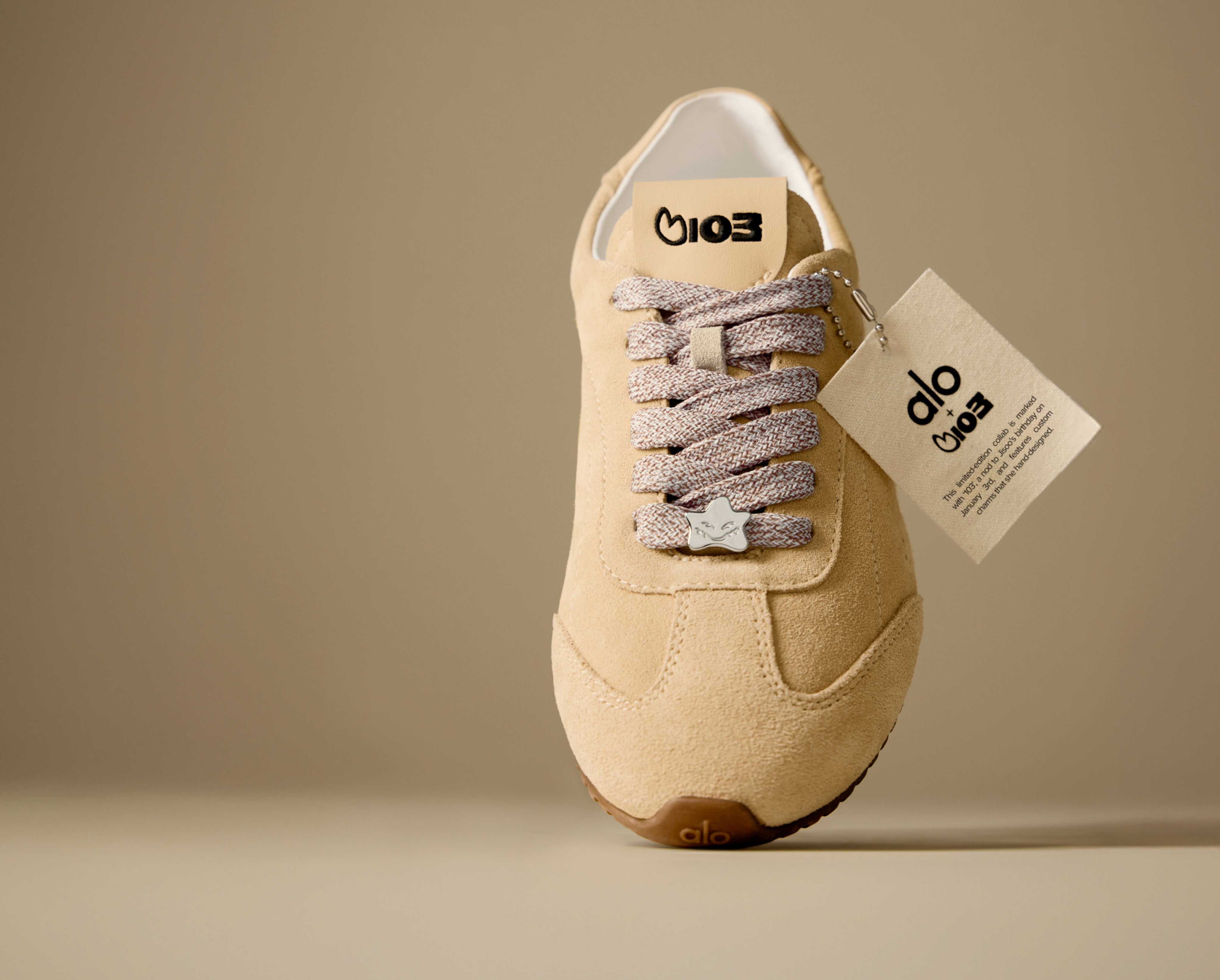 Close-up of the ALO x Jisoo Caramel Cream Sunset sneaker highlighting design details