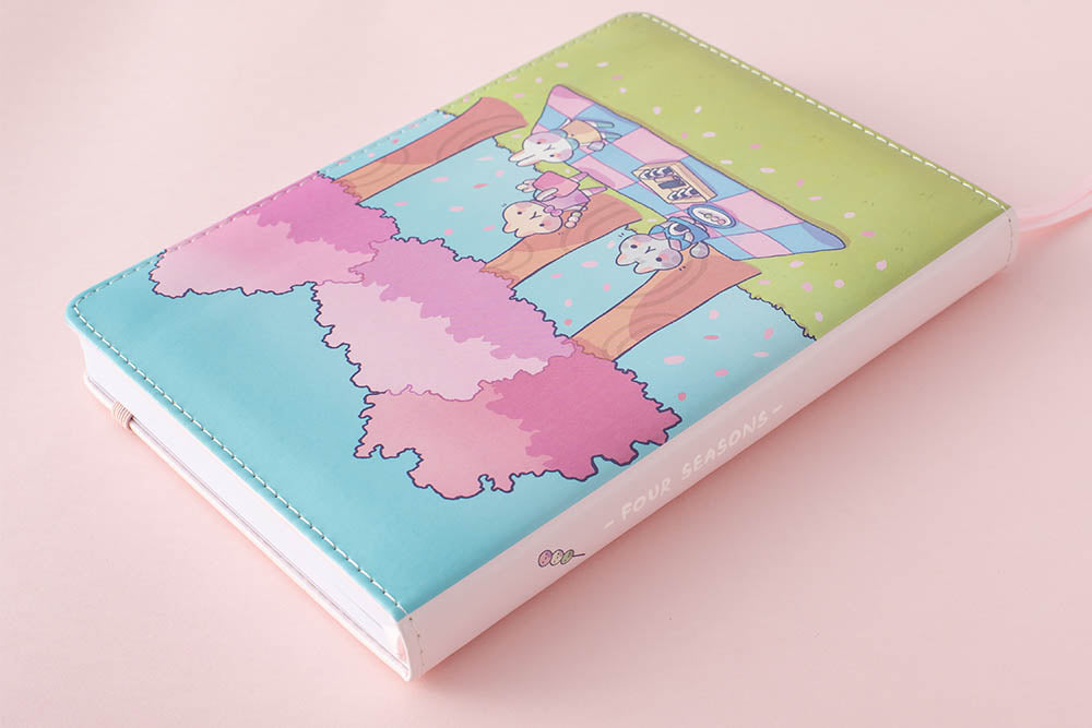 spring notebook spine in pink background