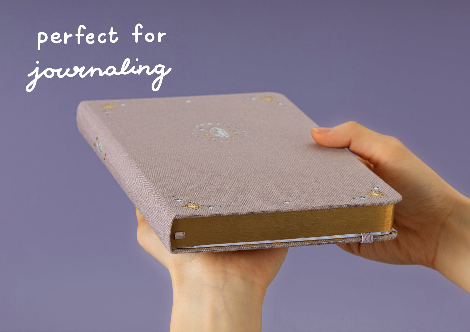 Open Tsuki Moonflower Magic Crystal Magic Notebook showing dotted pages for journaling.