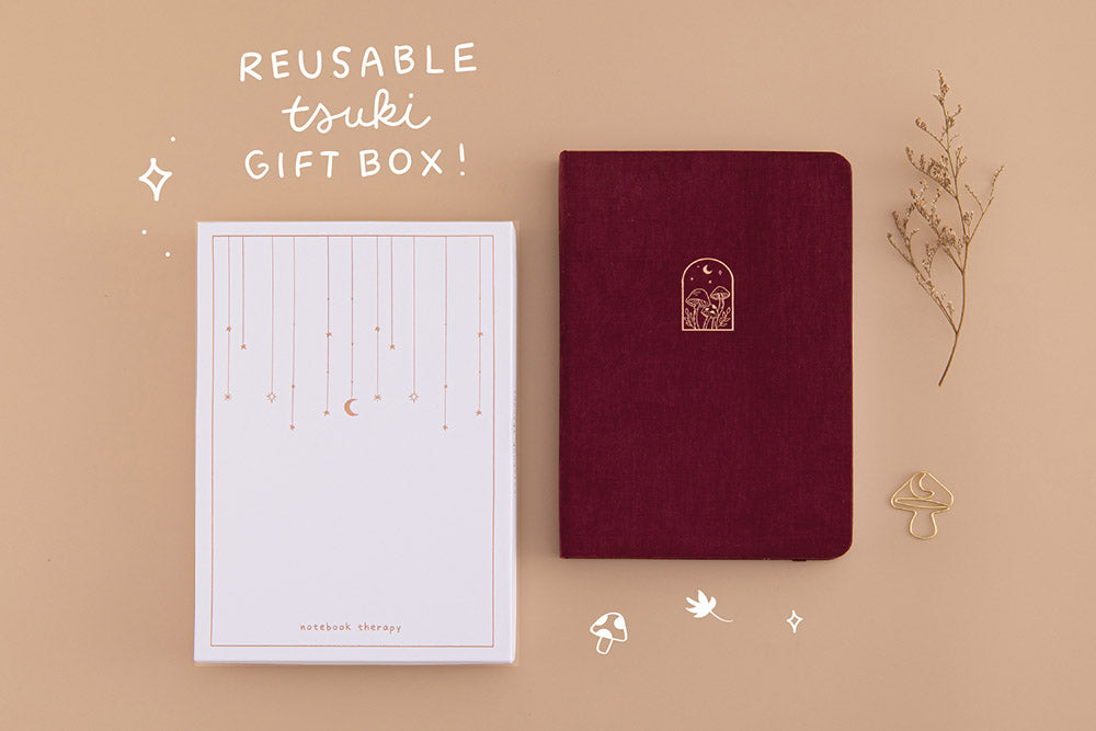 Tsuki ‘Kinoko’ Limited Edition Bullet Journal with reusable tsuki gift box and free paperclip gift with dried flowers on beige background