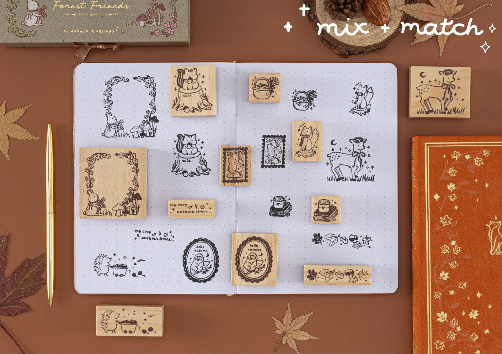 Mix and match Forest Friends wooden stamps displayed in a dotted journal spread, surrounded by journaling supplies.