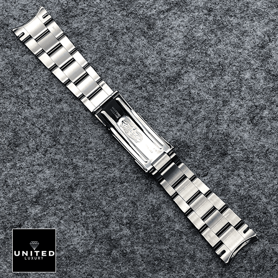 Rolex Datejust Perpetual 114300 Replica Stainless Steel Fold Clasp Bracelet on the table