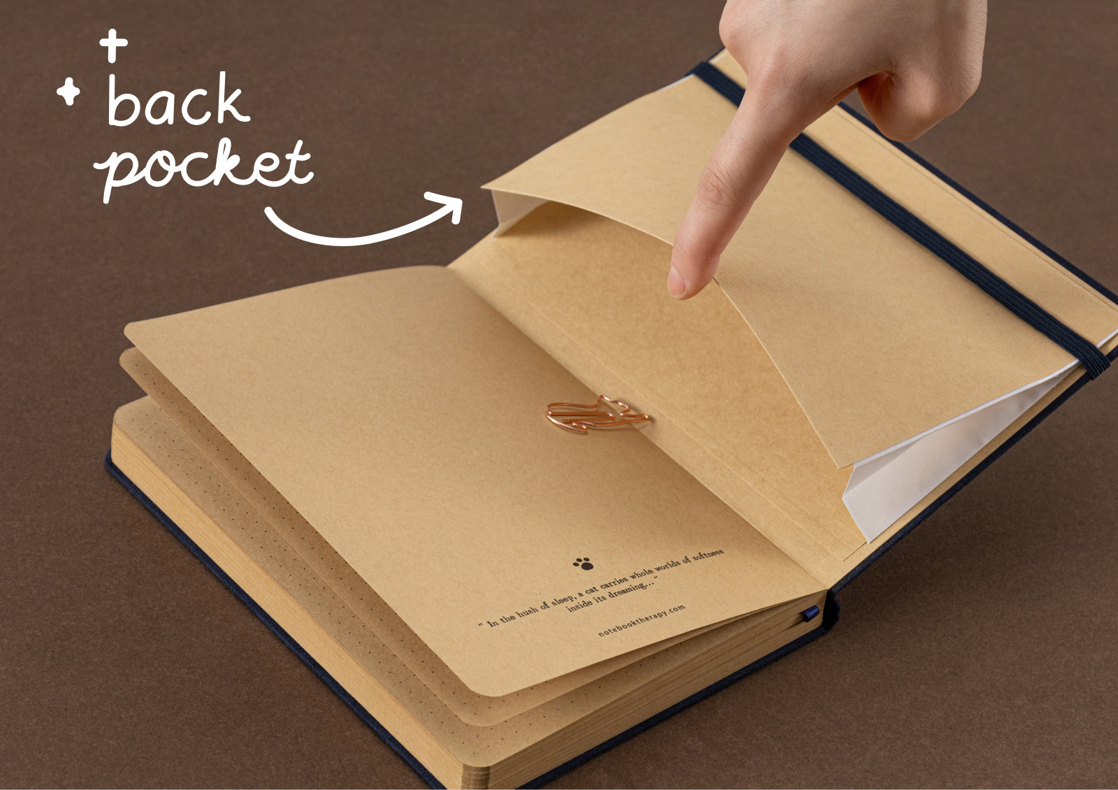 Free copper cat-shaped paperclip inside Tsuki Midnight Neko Dreams kraft notebook.