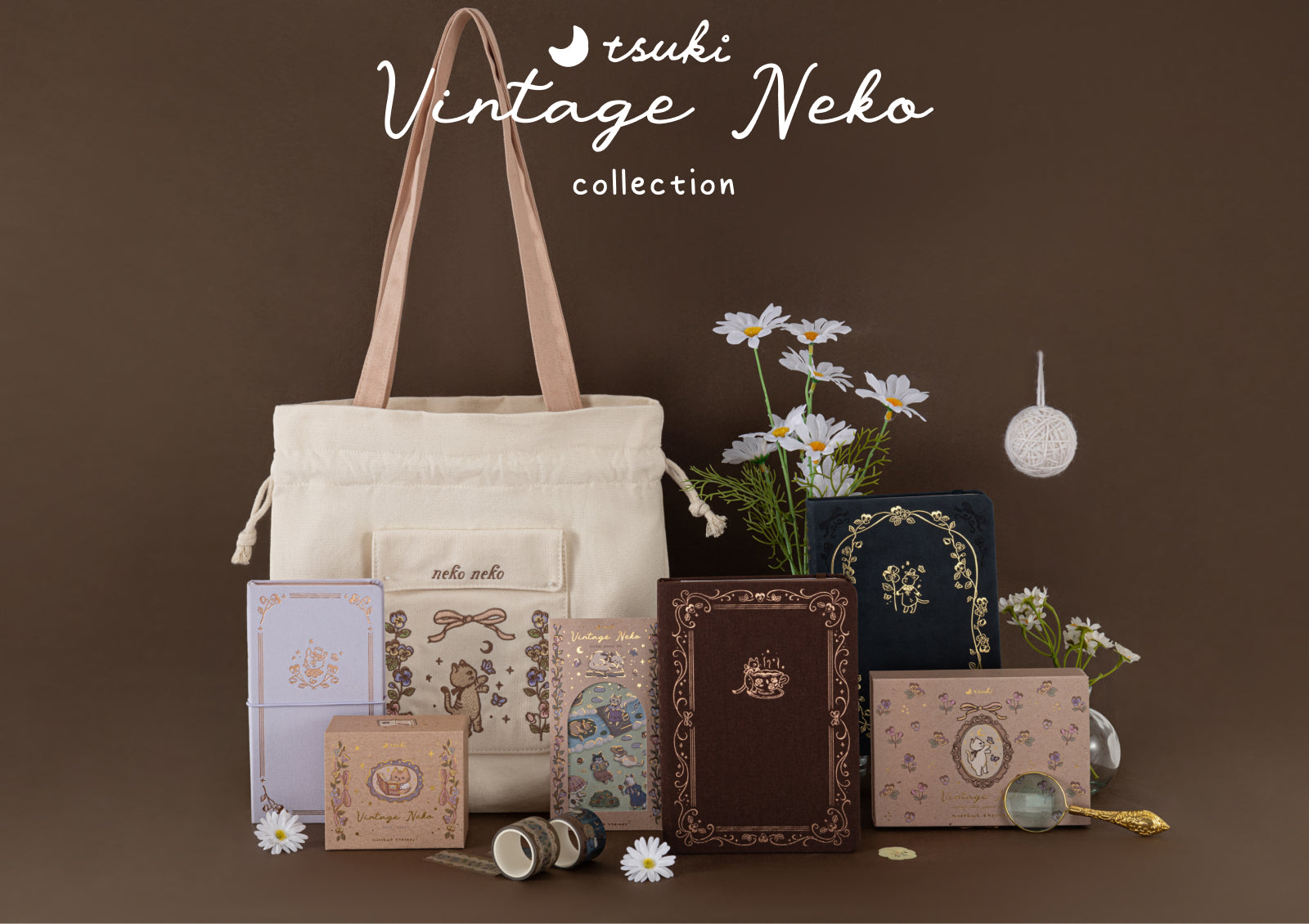 Official collection photo with the text 'tsuki Vintage Neko collection' featuring the tote bag, floral arrangements, and stationery items.