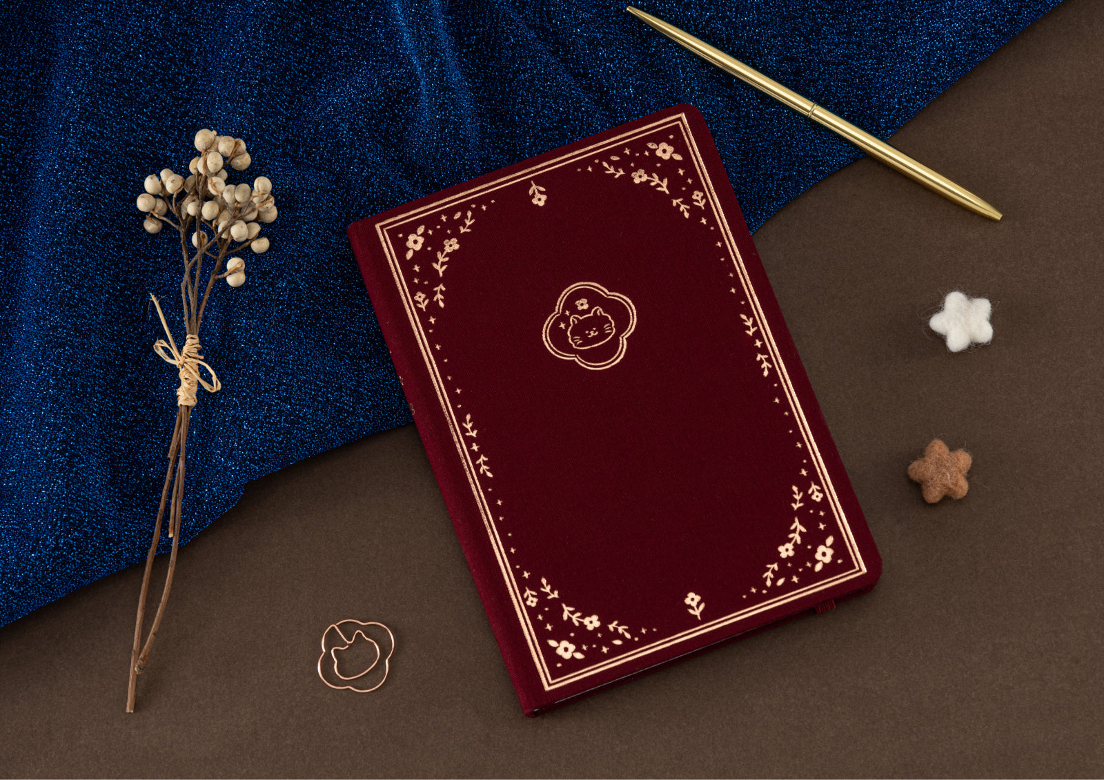 Tsuki Neko Dreams Neko Bouquet Notebook held in hands—compact and perfect for journaling.