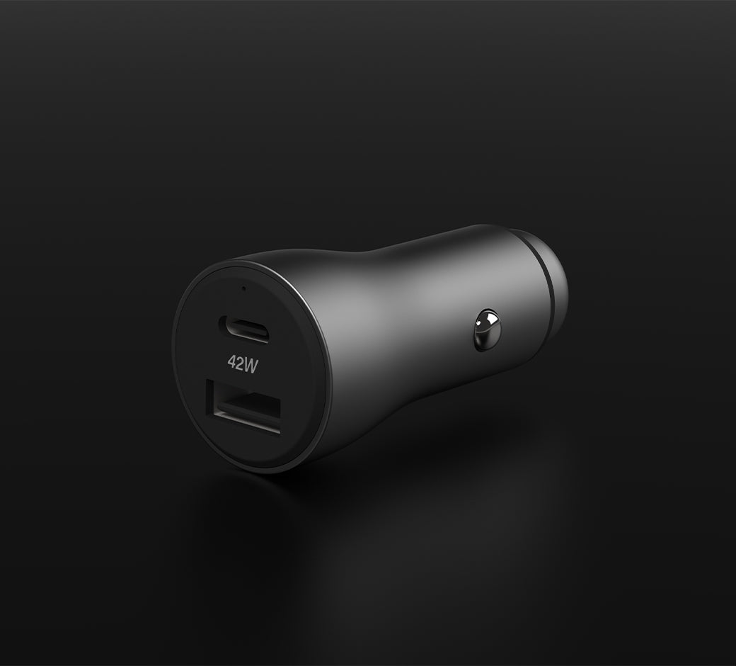 Dual USB car charger with 42W power capacity on a black background.